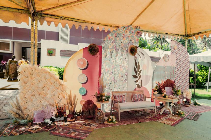 The marquee stage in pampas, palms and hand-painted panels
